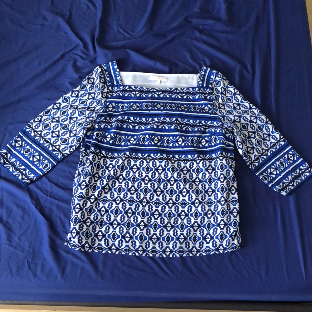 Blue and white patterned blouse
